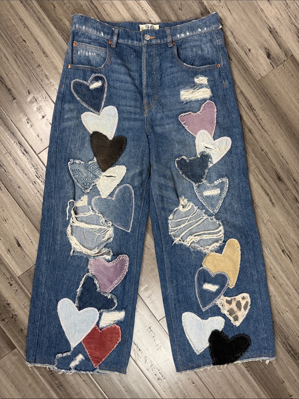 FREE PEOPLE WE THE FREE PIECE OF MY HEART PATCHWORK DISTRESSED WIDE LEG JEANS - Picture 2 of 14